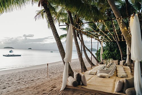 A custom dining setup on the beach at Kokomo Private Island Fiji