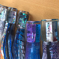 Kokomo branded fishing lures sitting on a table at Kokomo Private Island Fiji