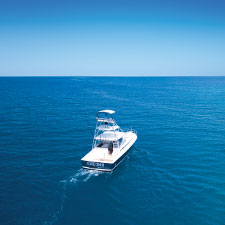 'Kahala' fishing boat
                    out on the water off the coast of Kokomo Private Island Fiji