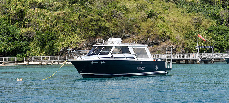 Explorer boat 'Yaukuve Explorer' out on the water off the coast of Kokomo Private Island Fiji