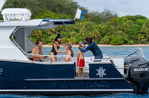 A family onboard a boat at Kokomo Island Fiji