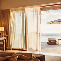 The living area of a luxury villa at Kokomo Private Island Fiji.